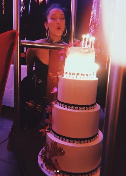 Bella Hadid and cake