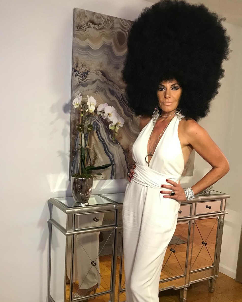 Hair, Afro, Hairstyle, Shoulder, Fashion, Black hair, Dress, Wig, Fashion design, Fashion model, 