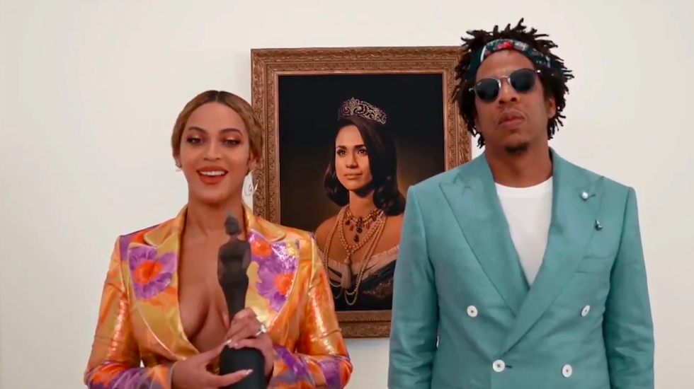 Why was there a Meghan Markle painting behind Beyoncé and Jay-Z at the Brits?
