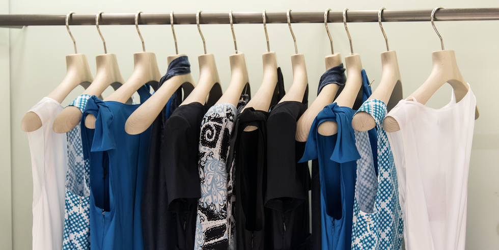 Clothes hanger, Blue, Clothing, Room, Dress, Boutique, Closet, Textile, Fashion design, Wardrobe, 