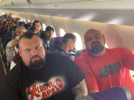 Strongman Eddie Hall Shares Funny Plane Photo With Brian Shaw