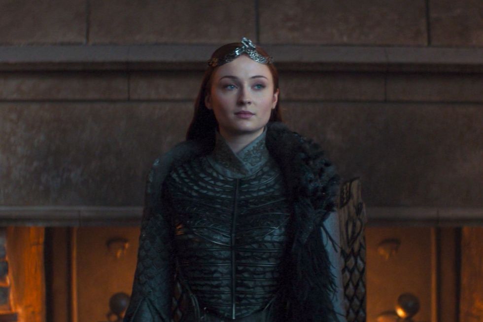Sansa stark's sleeves with fish scales to represent house tully