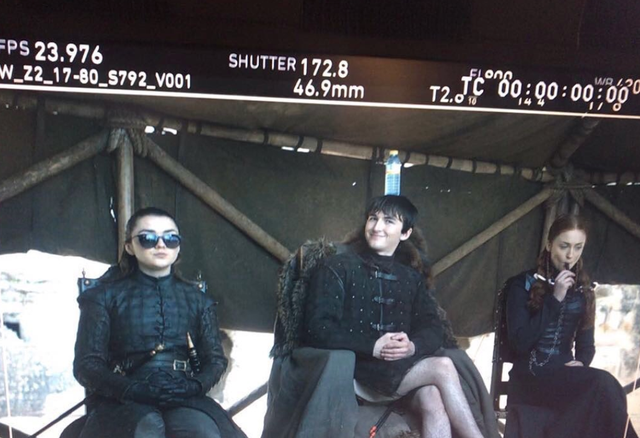 Goggles, Sitting, Sunglasses, Black hair, Leather, Fictional character, Boot, 