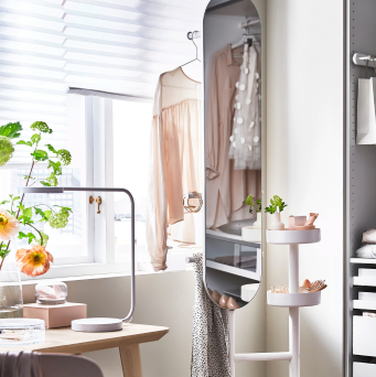 Ikea Makes a 3-in-1 Mirror That Serves as a Clothes Rack and Nightstand