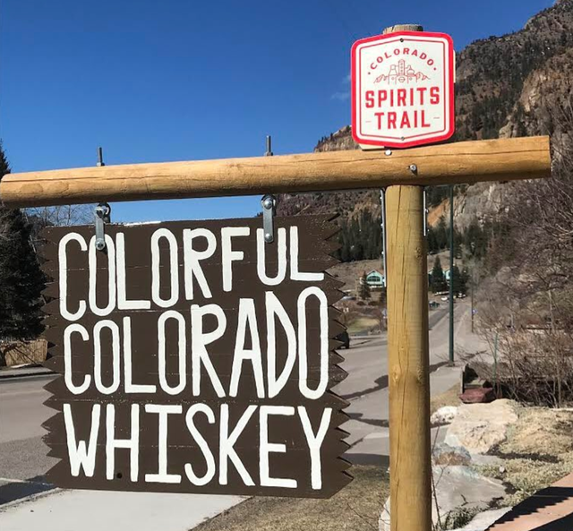 Sky, Signage, Font, Sign, Landscape, National park, Street sign, Tree, Mountain, Vacation, 