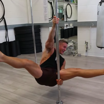 Watch This Bodybuilder Try Pole Dancing for the First Time