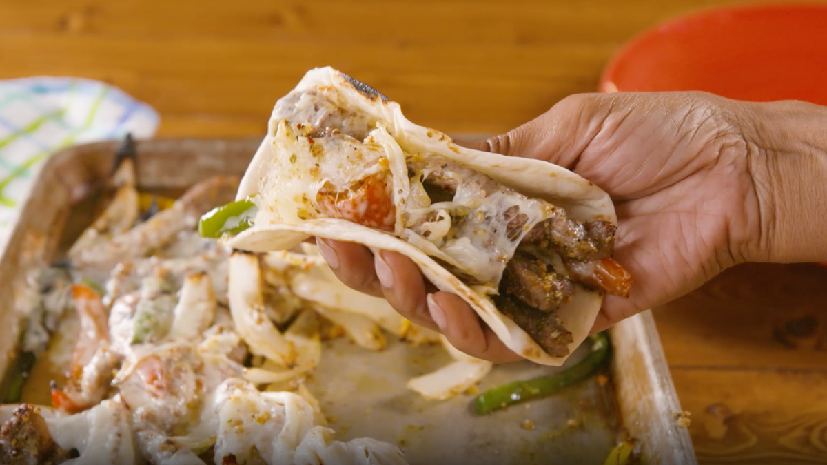 Video player poster image preview for Philly Cheesesteak Sheet Pan Fajitas Are A Dinner Savior