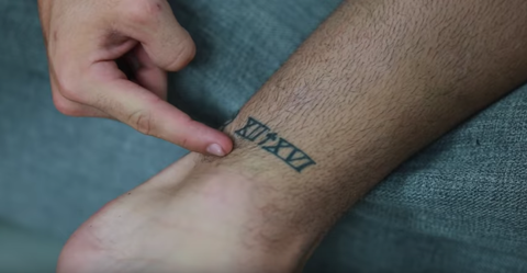 Skin, Tattoo, Joint, Arm, Wrist, Finger, Temporary tattoo, Font, Human leg, Muscle, 