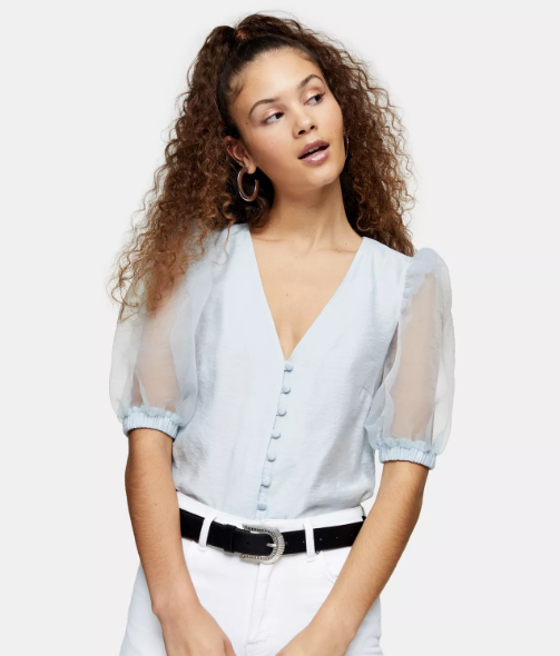 White, Clothing, Shoulder, Fashion model, Sleeve, Beauty, Photo shoot, Neck, Waist, Hairstyle, 