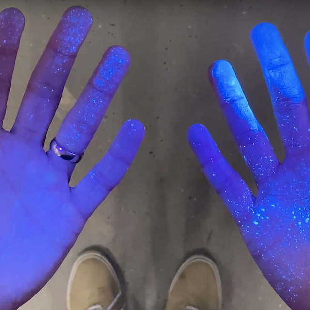 blacklight shows glowing powder on hands