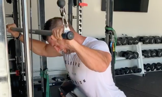 Tim Tebow Bench Presses 140-Pound Dumbbells In Insane Quarantine Workout