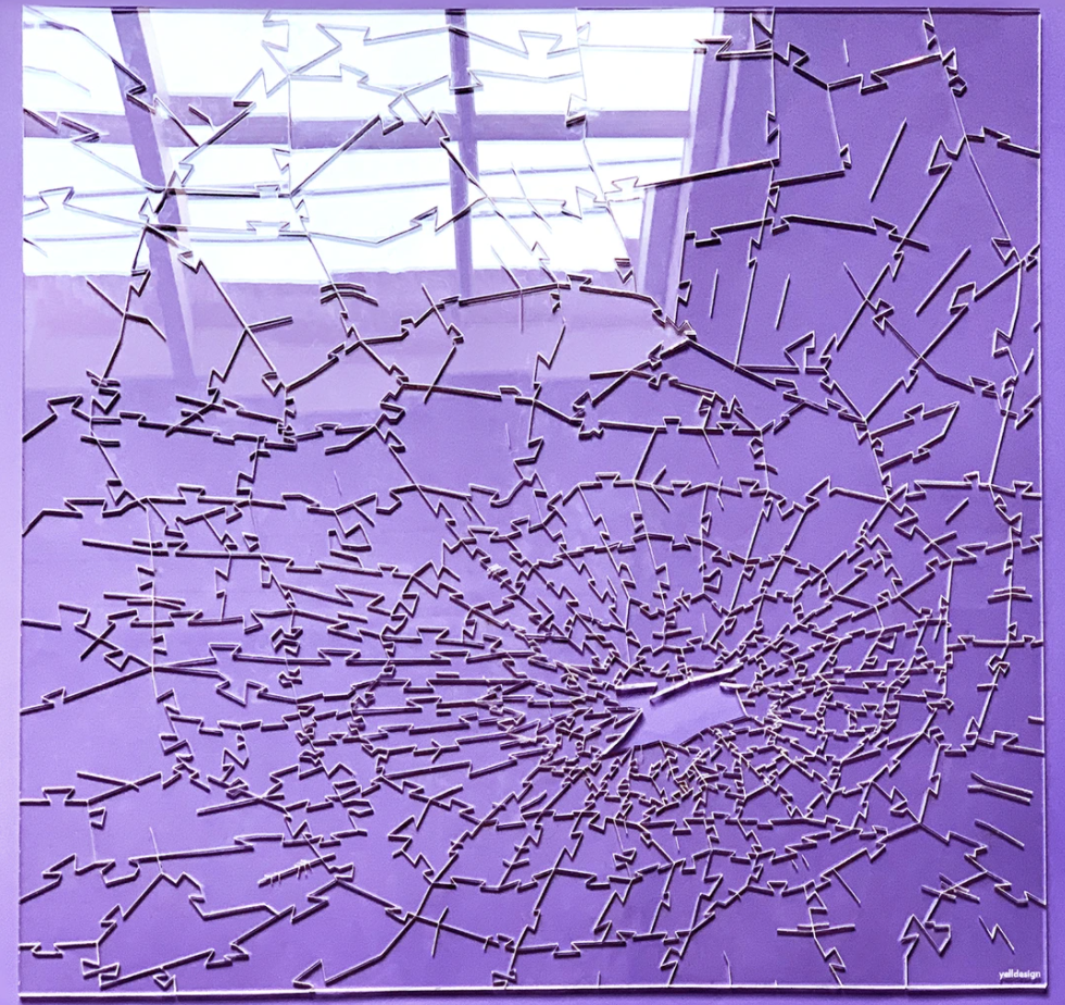 shattered glass clear puzzle on purple background