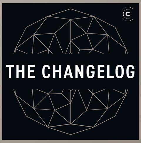 a sphere with geometric shapes in the background in black and white the words "the changelog" appear in the foreground in white