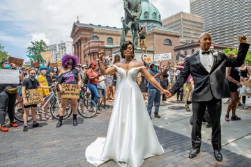 kerry anne and michael gordon at a black lives matter protest right before their wedding in philadelphia, pa