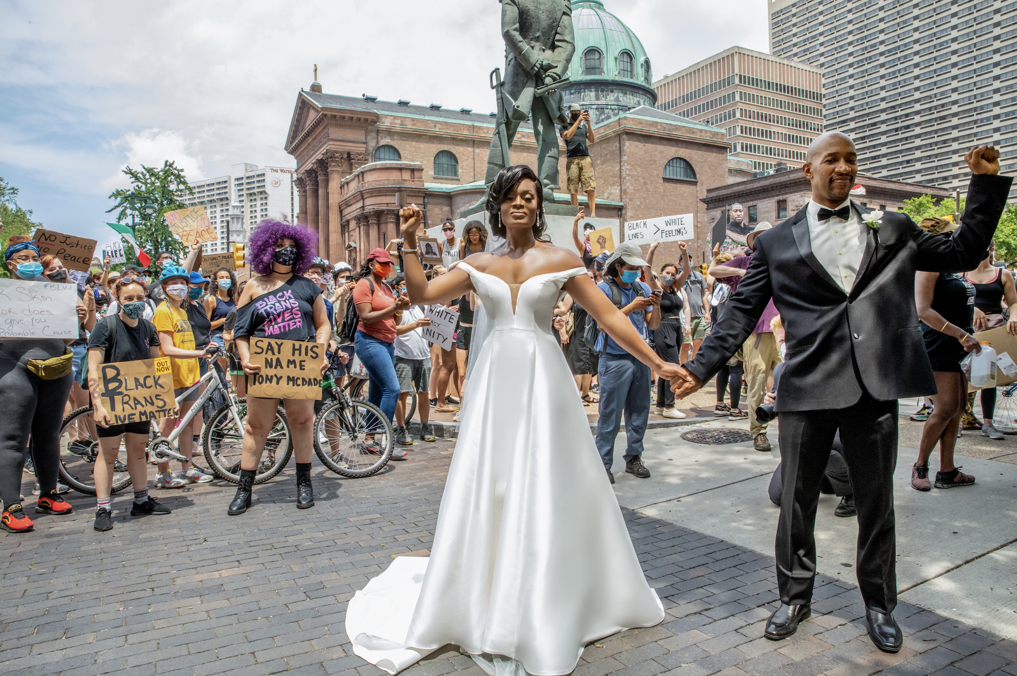 kerry anne and michael gordon at a black lives matter protest right before their wedding in philadelphia, pa