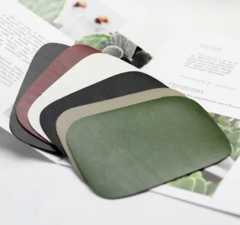 cactus leather samples in green, beige, black, white, and wine colors