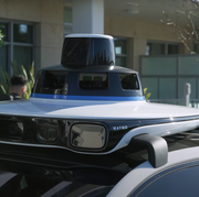 waymo driver on test car