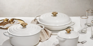 le creuset white and gold knob collection