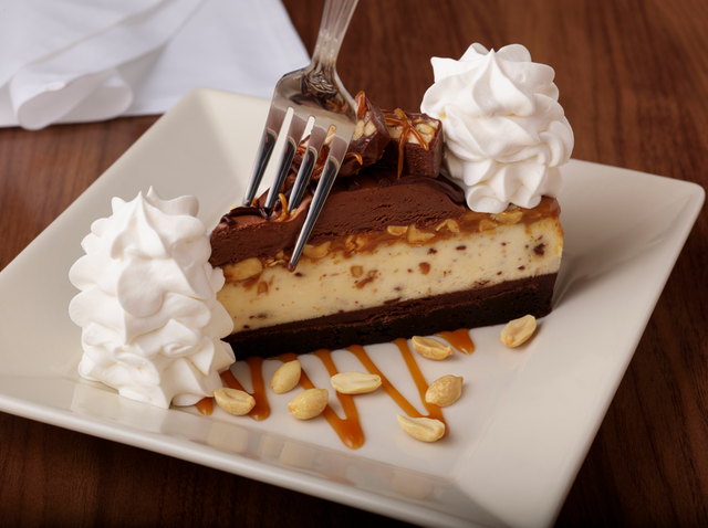 chocolate caramelicious cheesecake made with snickers