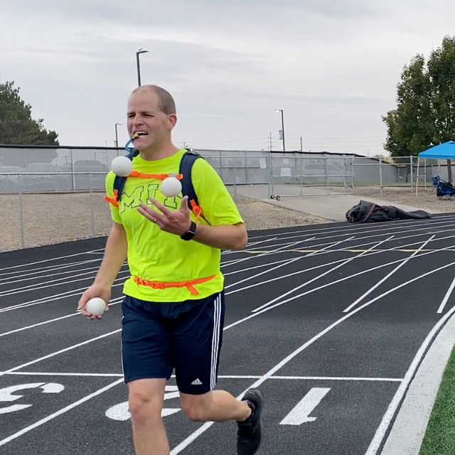 david rush joggling through his world record attempt for longest distance traveled while juggling