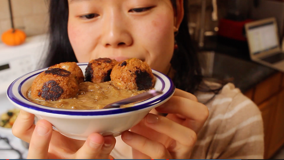 june stares lovingly at a bowl of vegan french onion soyaballs