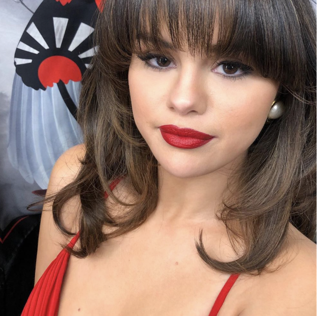 selena gomez with a red lip