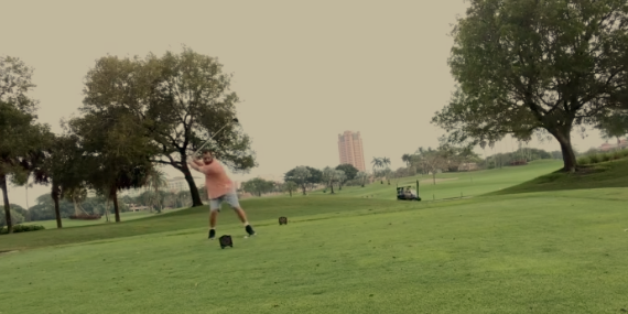 Adam Sandler performs the most unbelievable trick shot of golf history! 