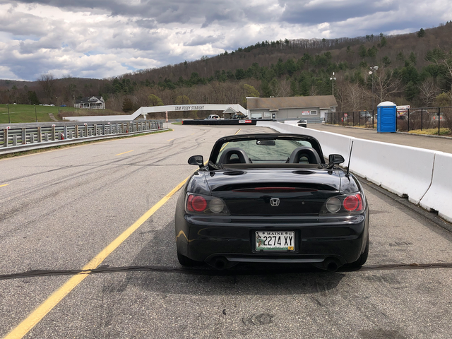 A fastback style Honda S2000 not gonna lie i think it looks amazing  especially in a black and white body with that engine bay stuffed full of  red chrome accents 👌 Fully