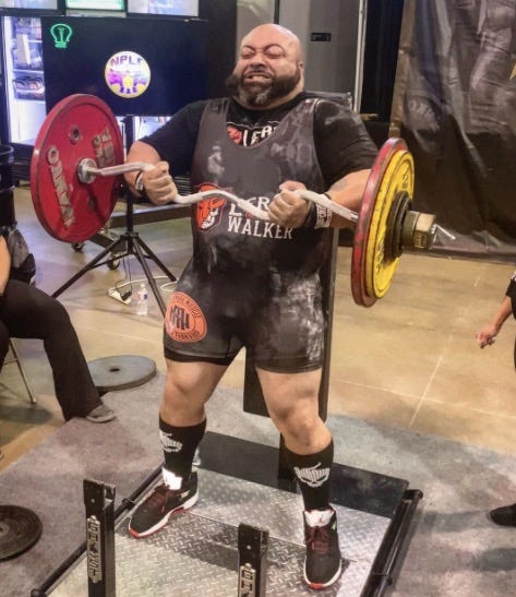 powerlifter-leroy-the-machine-walker-strict-curls-over-100kg