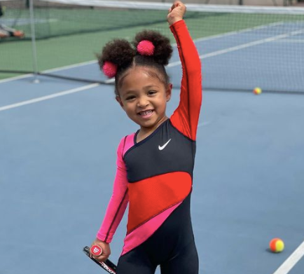 Serena Williams' daughter Olympia practices tennis while her dad