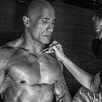 the rock shirtless and working with black adam crewmember