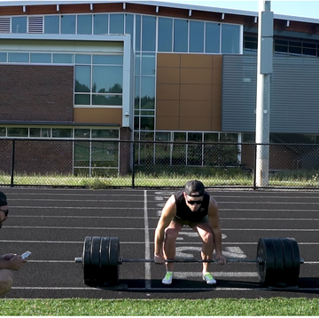 nick symmonds deadlifting on a track