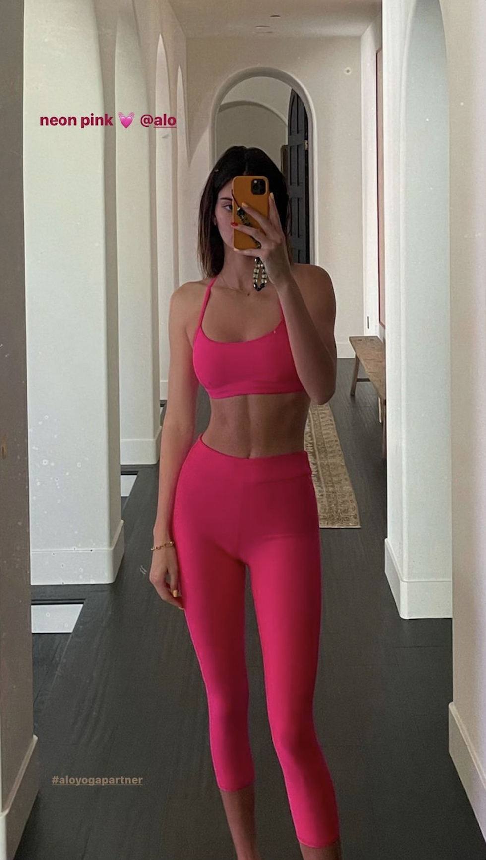 Kendall Jenner's Serving Body in A Pink Alo Sports Bra and Leggings