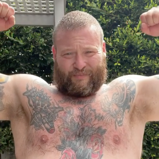 action bronson flexing his muscles