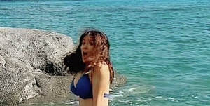 salma hayek in a blue bikini
