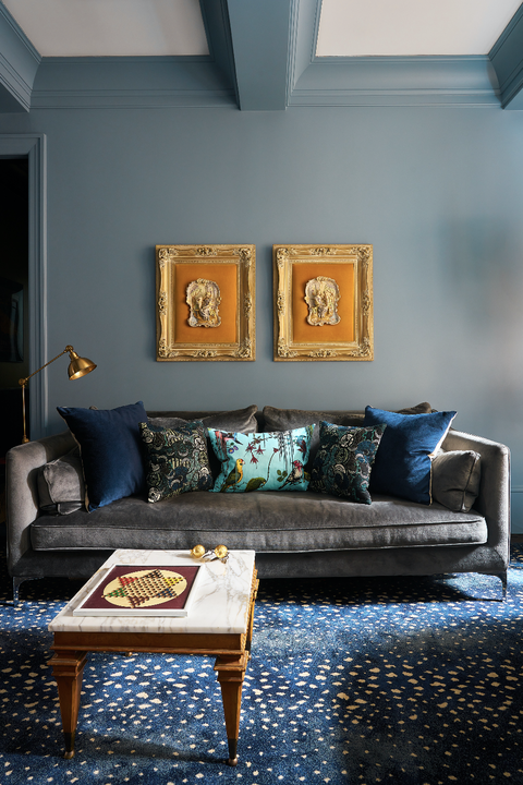 blue living room with sofa