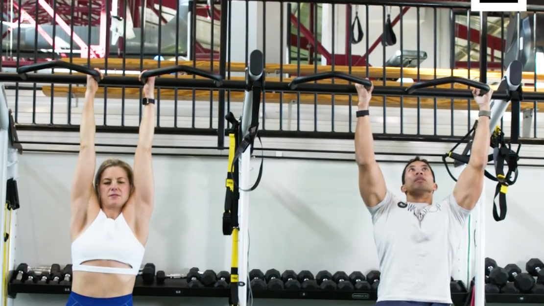 This Partner Hanging Leg Raise Core Workout Is Great for Your Abs