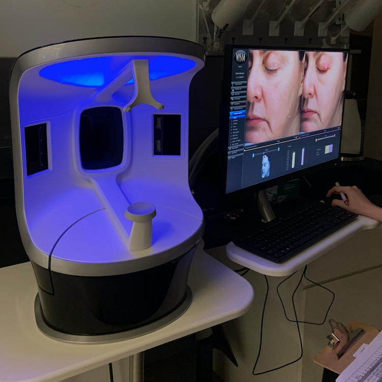 the visia complexion analyzer being used to test skincare products like dark spot correctors in the good housekeeping institute beauty lab