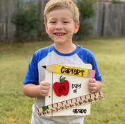 best first day of school signs  child holding first day of kindergarten sign