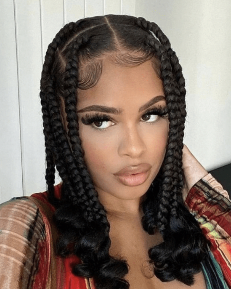 short and big box braids with curly ends