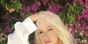 Christina Aguilera posts TOPLESS snap of her breasts being cupped