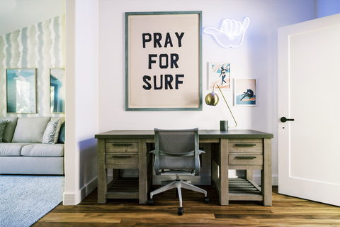 surf themed bedroom with desk and sofa