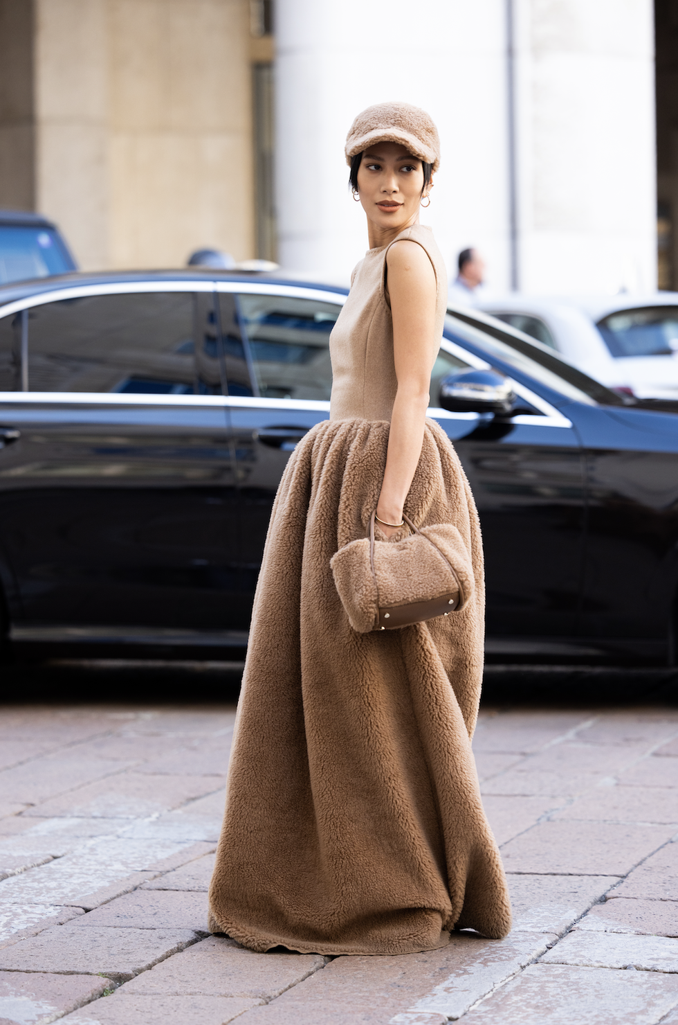 molly chiang is seen wearing a camel fur dress and hat outside max mara show during the milan fashion week  womenswear springsummer 2023 on september 22 2022 in milan, italy