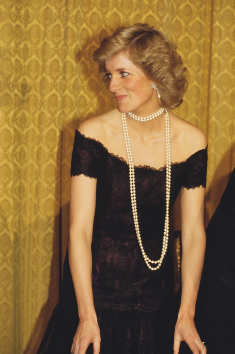 princess diana wearing a lace victor edelstein gown