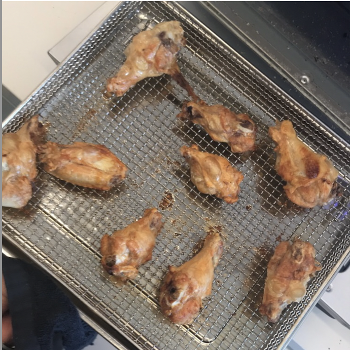 air fried chicken wings on a wire rack
