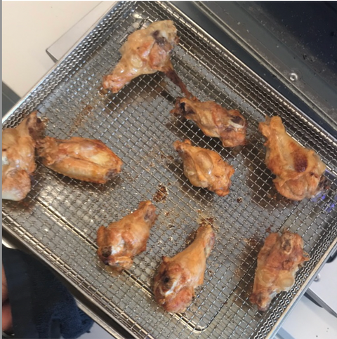 air fried chicken wings on a wire rack