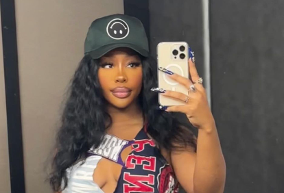 SZA Is *So* Strong In A College-Themed Cut-Out Dress In A New IG Photo