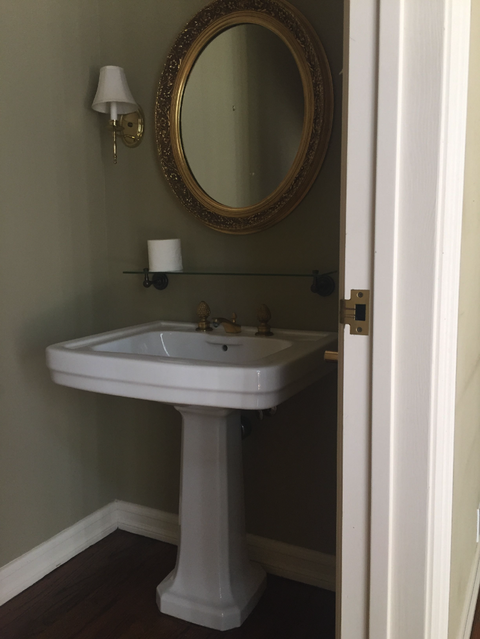 bathroom remodel ideas, before white pedestal sink with round mirror
