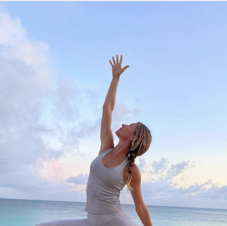 Gisele Bundchen performs bikini-clad yoga pose on beach