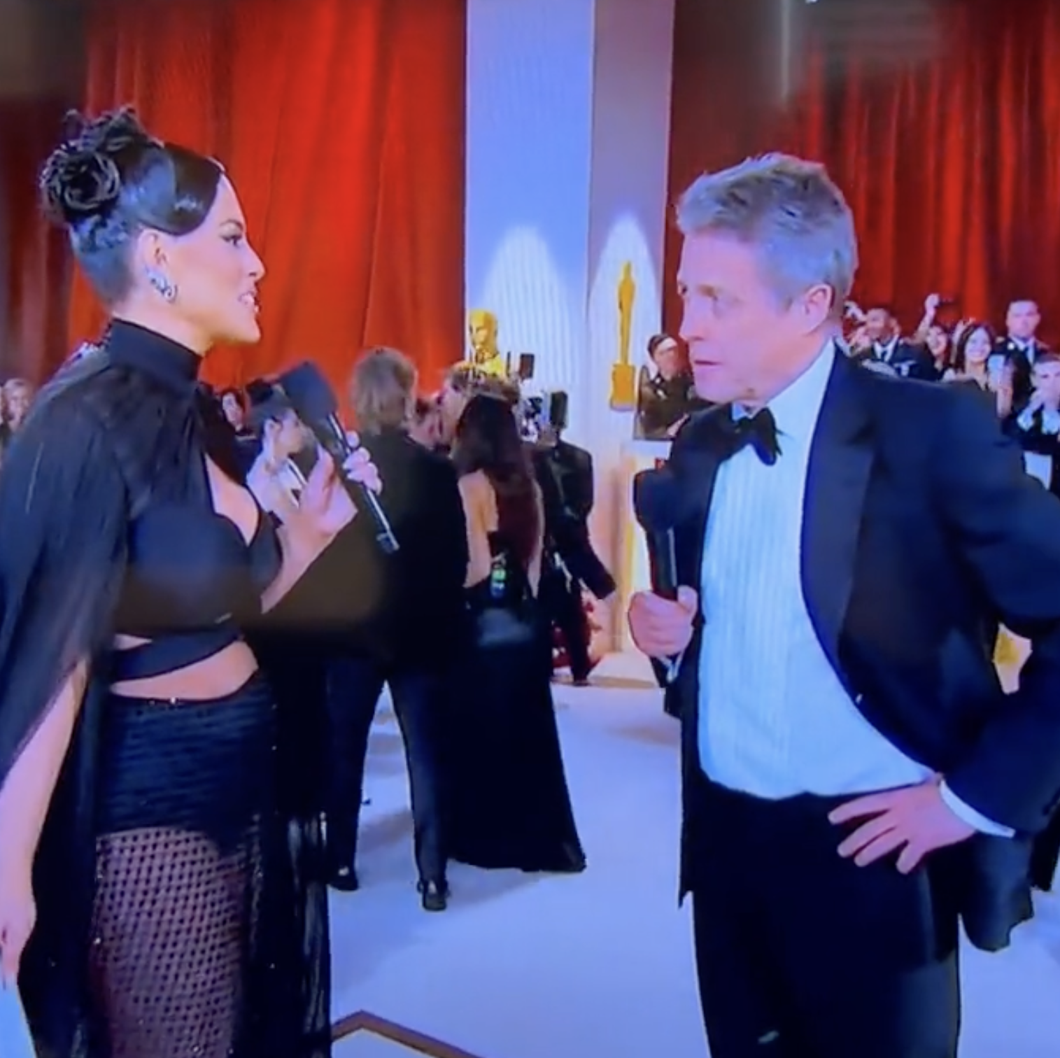 Hugh Grant Is Being Called Out for Acting Super Rude Toward Ashley Graham on the Oscars Red Carpet